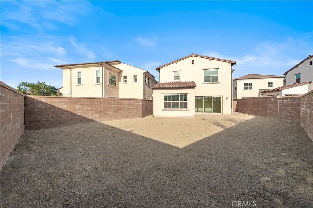 Photo of 128 Rimstone, Irvine, CA 92618 (MLS # OC25275856)