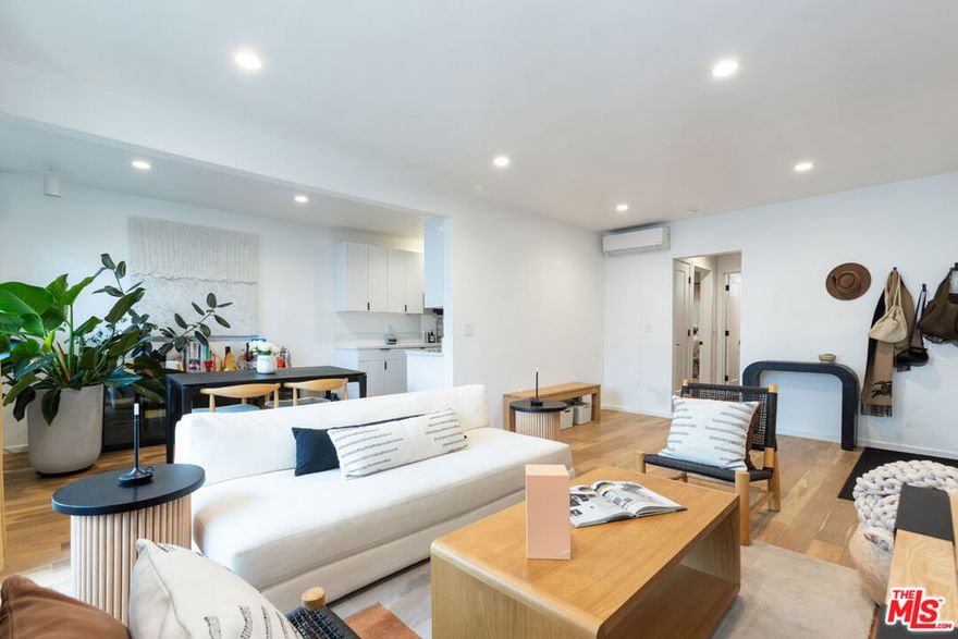 California soul and iconic Palm Springs vibes come together at this cool 8-unit Tenants in Common (TIC) community in West Hollywood. This upscale rehabbed unit brings a keen eye for design with matte oak flooring, crisp white walls, earth tones and organic elements throughout. This gorgeous mid-century upper level one bedroom, one bathroom, offers spacious, light-filled rooms with ample closet space and a south-facing balcony. Featuring designer lights and fixtures, an amazing bath and kitchen with high end appliances, in-unit washer and dryer, AC & heat, subterranean parking including one spot, and an additional private storage room. Recent upgrades include new hallway cabinetry with a standing desk, upgraded closets with new shelving, Roman clay paint in the bedroom, and smart home features including Lutron lighting and front door Yale lock. Also, HOA is only $300 per month! This rare find is in a great Weho location, just a quick walk to Melrose Place, the Sunday Farmer's Market, Strings of Life, the Roger Room, La Boheme, the Peppermint Club, Holloway House, and downtown West Hollywood. Also close to the best coffee shops, boutiques and cafes on Melrose and Beverly. This one is too fabulous to miss!