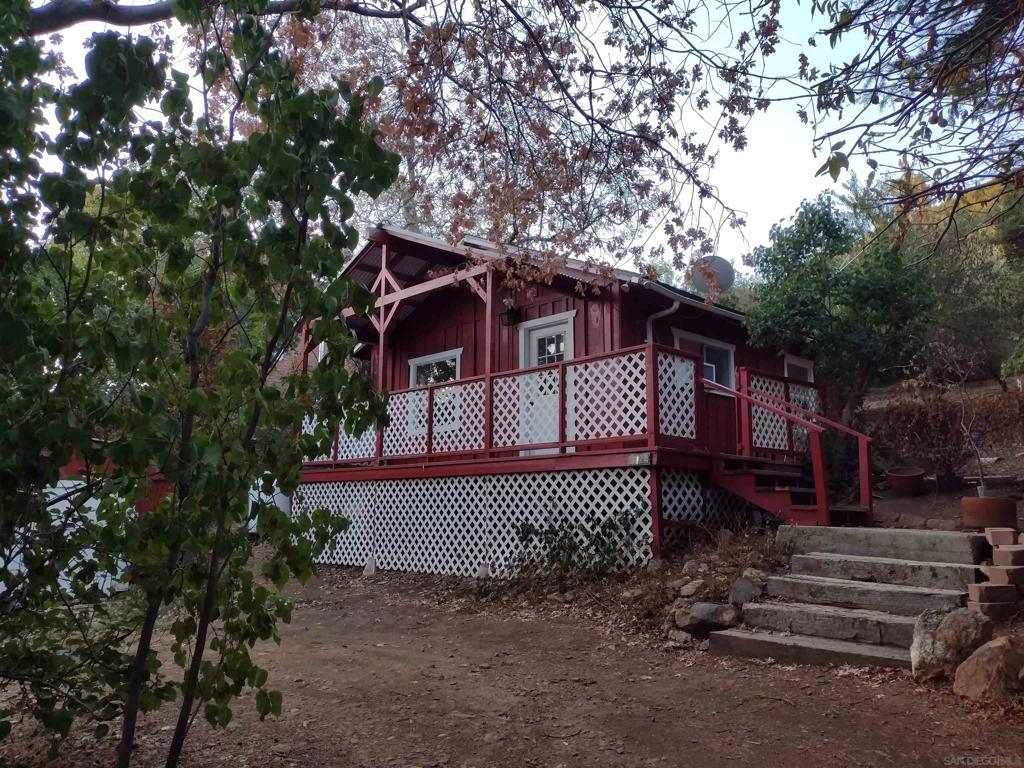 Cute cabin home with lots of charm in a beautiful, quiet neighborhood. New roof. Freshly painted interior with new flooring in all rooms. Private backyard with fruit trees. Great-sized covered front porch. 1.8 miles to downtown Julian. 1.5 miles to school. 10 miles to Lake Cuyamaca. View the Milky Way in this Dark Sky community. 2 miles to the local park. Pictures will be posted on 9/11