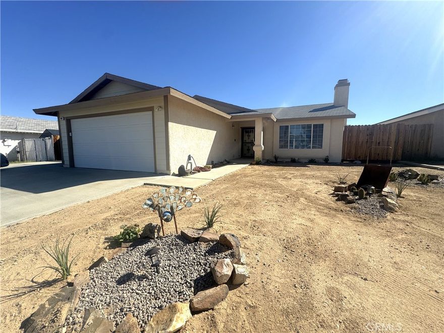 Welcome to an easy-living 3 bed/2 bath in SW Ridgecrest-ideal for first-time buyers and NAWS China Lake transfers. Bright living room with picture window, ceiling fan, and cozy brick fireplace. Dining opens by slider to the covered patio for effortless indoor/outdoor living. U-shaped kitchen with long tile counters, abundant cabinetry, black appliances, and a window over the sink. Comfort continues with true dual cooling-central A/C plus evaporative-plus ceiling fans throughout. Private primary suite has mirrored closets and en-suite step-in shower; two more bedrooms and a full hall bath serve guests, office, or gym. Inside laundry room, two-car garage, and a handy backyard shed streamline daily life. Out back, the fully fenced, level yard is a blank slate-add DG or turf, garden beds, play set, or pet run. Concrete patios and walkways keep maintenance low. Front yard is a blank canvas-desert plants and gravel = quick curb appeal. Minutes to Base, schools, parks, groceries, and Hwy 178/395. Clean, comfortable, and ready to personalize-start smart in Ridgecrest with space to grow and a floor plan that works. FHA/VA/conventional-friendly;