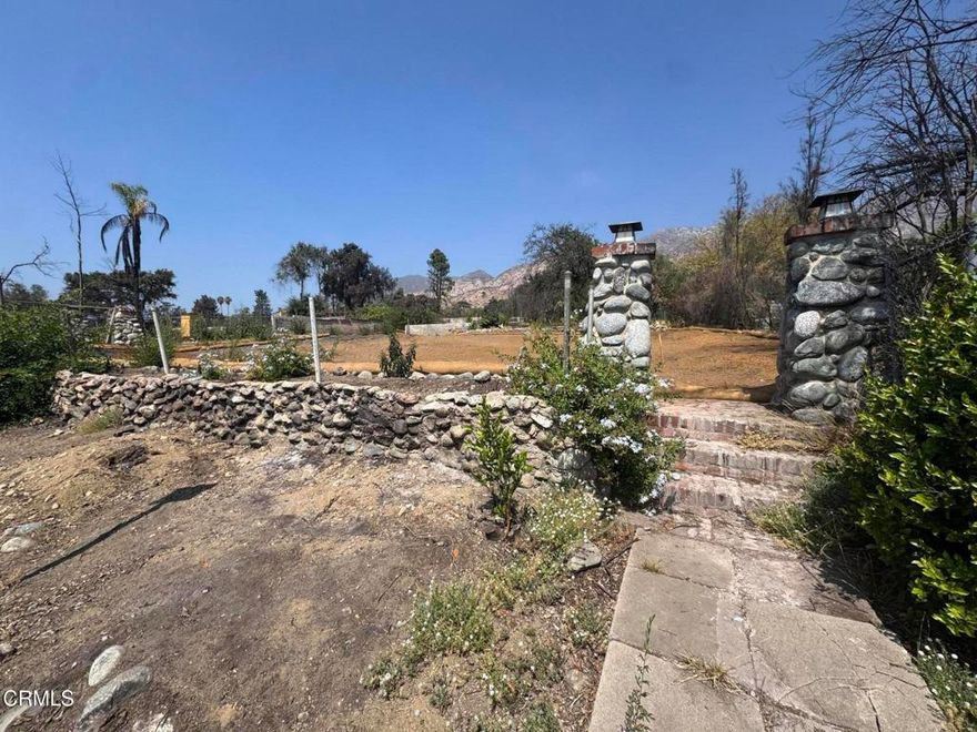 Set against the foothills of Altadena, this rare land offering presents a fresh start after the property was lost in the recent fires. Spanning nearly a quarter acre, the lot provides ample room for a new custom build, ADU potential, or a thoughtfully designed estate surrounded by nature. Although the address fronts Lake Avenue, the home's entry is privately situated on Athens Street, offering a more intimate neighborhood feel with convenient access.