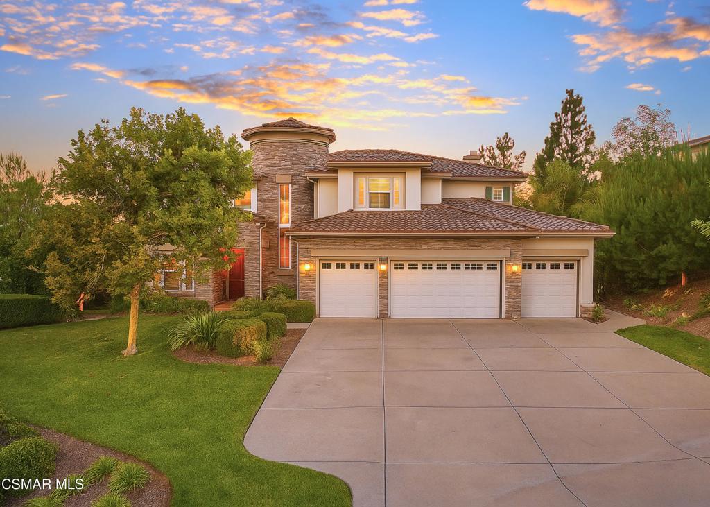 Welcome to 12364 Palmer Drive, a stunning luxury estate located in the prestigious gated community of Country Club Estates in Moorpark. This two-story masterpiece offers 4,764 square feet of thoughtfully designed living space with 5 bedrooms and 6 bathrooms, all set on a half-acre lot with breathtaking mountain views and close proximity to the Moorpark Country Club and its scenic 27-hole golf course.As you step through the grand two-story foyer, you're greeted by soaring ceilings, a sweeping curved staircase, and an open, elegant layout. The first floor boasts a gourmet kitchen featuring stainless steel appliances, double ovens, a six-burner stove, granite counters, a center island, and a breakfast nook that flows seamlessly into the spacious family room with built-in cabinetry and a media niche. Formal living and dining rooms provide a perfect setting for hosting gatherings, while a private study/library adds sophistication and functionality. A first-floor guest suite with a private bath offers ideal accommodations for extended family or visitors. Upstairs, the primary suite is a private sanctuary complete with a sitting area, dual walk-in closets, a spa-like bathroom with a jetted soaking tub, dual vanities, and a walk-in shower. The suite also includes a balcony with stunning sunset views. Three additional bedrooms each feature their own private ensuite bathrooms, along with a flexible activity room perfect for a gym, office, or playroom. The backyard is an entertainer's dream, featuring a resort-style pool and spa, an outdoor pavilion with a grand fireplace, a built-in BBQ with bar seating, and multiple lounge areas surrounded by lush landscaping. Whether hosting a summer party or enjoying a quiet evening under the stars, this backyard offers year-round enjoyment. Additional highlights include a four car garage, individual laundry room, central dual zone HVAC, and community amenities such as tennis courts, pickleball, playgrounds, and walking paths. This is more than a home, it's a lifestyle of elegance, comfort, and California luxury. Some images are virtually staged.