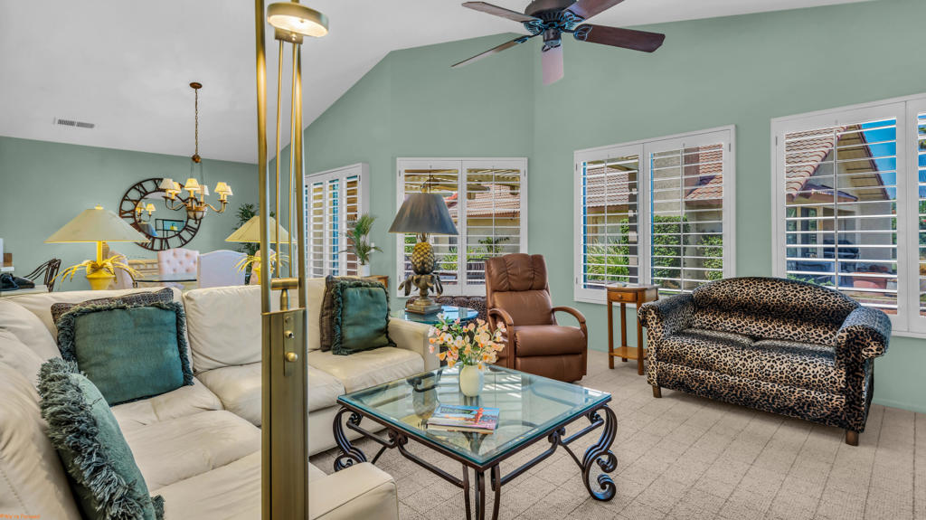 Highly sought-after 3-bedroom, 2-bath floor plan--one of the best values in Country Club living!Nestled within the gates of Oasis Country Club, this home offers not only a desirable layout but also access to an exceptional lifestyle. Here, resort-style amenities meet a vibrant, active community, with 18 sparkling pools and spas, tennis and pickleball courts, a netted golf practice area, an 18-hole putting course, and a welcoming clubhouse with two on-site restaurants. The beautifully maintained golf course was recently ranked one of California's Top 25 by Golf Advisor! Oasis CC is member-owned and not age-restricted, making it perfect for year-round living or a vacation retreat.This meticulously maintained home, set along a lush greenbelt, is just steps from a pool and spa. The open living and dining areas feature vaulted ceilings and a wall of windows with a sliding door leading to your private patio. A cozy fireplace makes winter evenings warm and inviting. The primary suite offers two closets, an updated shower, and direct access to a private patio--which also connects to the attached two-car garage.Come experience the comfort, charm, and unbeatable amenities that make Oasis Country Club such a special place to call home.