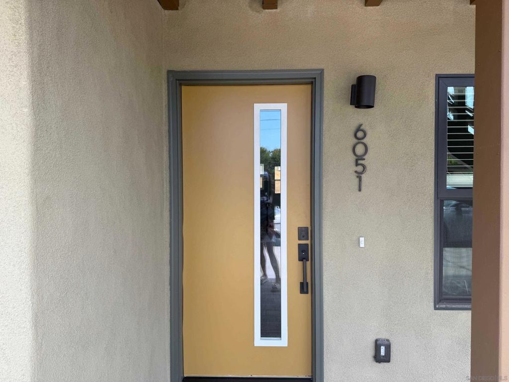 Quiet lower level fully renovated unit with laminate flooring throughout, stainless steel appliances, large private patio off kitchen, ceiling fans in all room and shared laundry room with CC operated machines. Unit has its own EV charging plug and one reserved parking. This is a six unit complex located just a short walk to Wind'n Sea beach, shops and restaurants in Birdrock. Available for immediate occupancy.