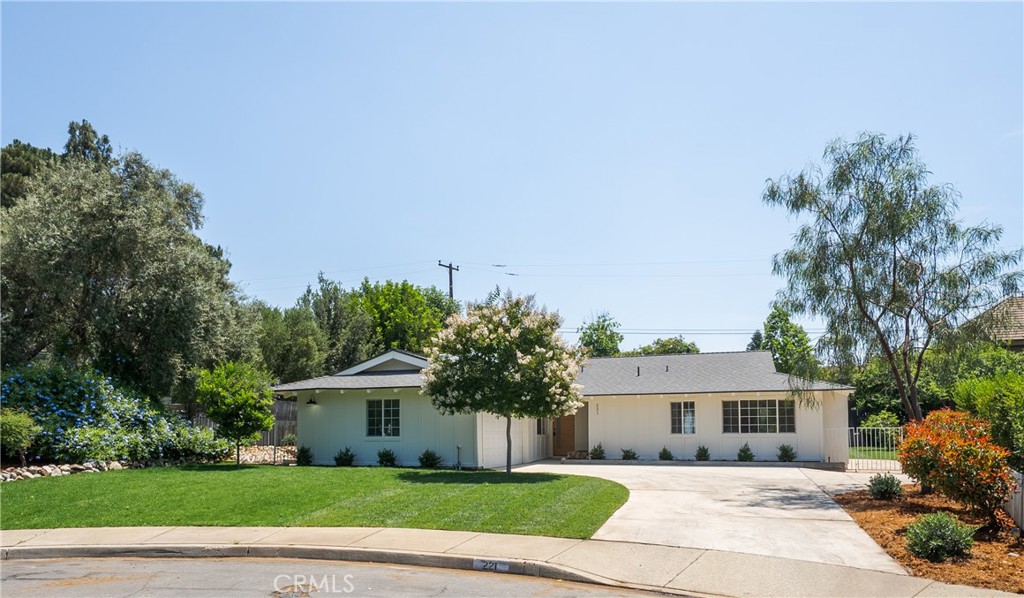 This beautifully upgraded home sits at the end of a cul-de-sac in North Claremont, just North of the 210 freeway. Everything is fresh, new, and ready for you to move right in and start enjoying the Claremont lifestyle. A spacious entryway immediately welcomes you into the home, leading to an over-sized family room which is centered around a lovely fireplace with solid wood mantle. Moving through to the dining and kitchen area, there is plenty of room for large dining table- perfect for entertaining. The kitchen is all brand new, with quartz counters, oak cabinetry, brand new appliances, and a plethora of storage. Here you'll also find direct access to your attached 2-car garage. New waterproof vinyl flooring flows throughout the home, in an airy light oak color. Down the hall, you'll find the first bathroom, with dual sinks, oak vanity, and a cheerful tile color scheme. The secondary bedrooms are both a great size. At the end of the hall in the primary suite, you'll enjoy the convenience of dual sinks, an oak vanity, quartz counters, and not one, but two closets! The freshly tiled shower has a spa-like aesthetic, with a neutral palette, pebbled floor, and gorgeous new glass shower surround. The upgrades don't end inside the home, the exterior is freshly painted and new landscaping is in place. Enjoy the outdoors, with the La puerta Sports park, Higginbotham Park, and the Sycamore Canyon Hiking Trailhead all located less than a mile from your front door; Or, head straight down Indian Hill Boulevard to the heart of the Claremont Village to experience all the dining and special events that make Claremont such a special place to call home.
