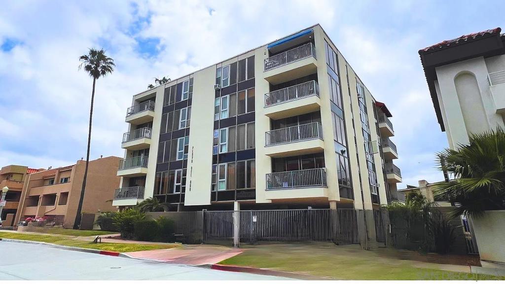 Completely renovated with all new kitchen, baths, tile, appliances, LVP flooring, electronic shades, and in unit washer/dryer! Gated entry and parking with on assigned space. Additional spaces available for an additional fee. Use of community pool and amenities included.