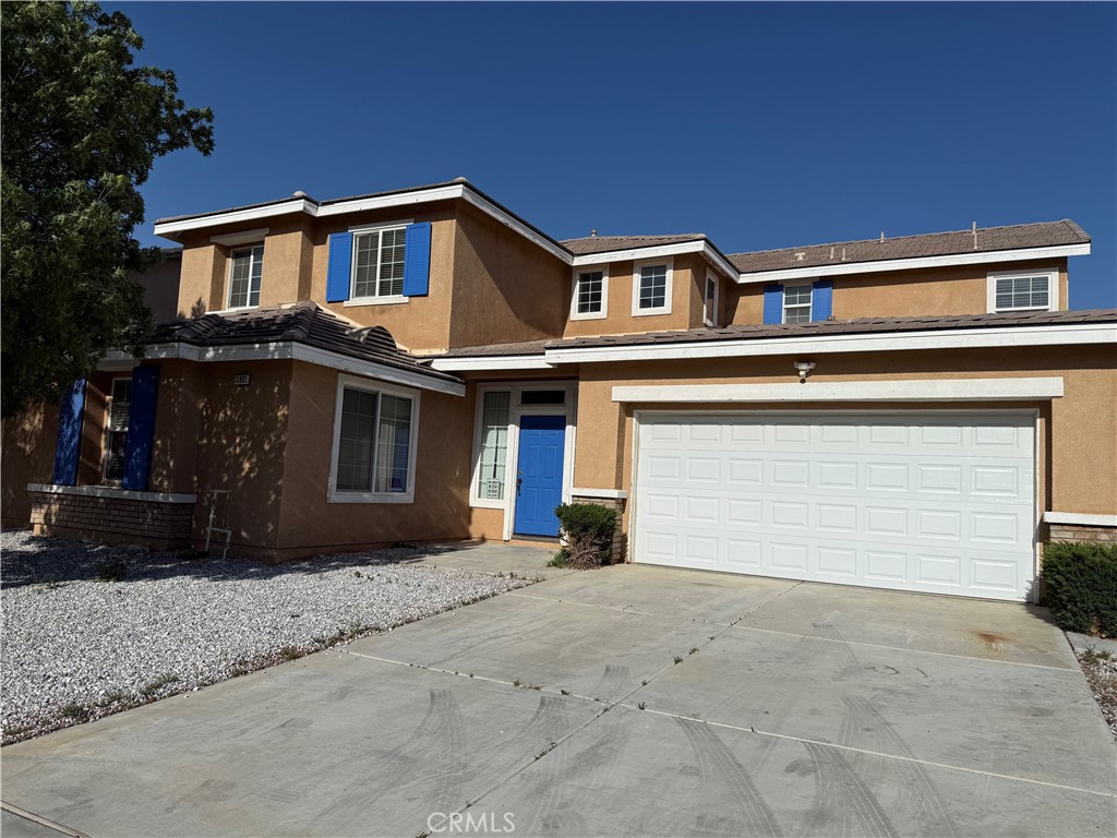 This beautiful Features 2 master bedrooms. One downstairs and 1 upstairs along with 2 additional bedrooms. This spacious homes offers a 2 car garage, fire place and just lots of space. conveniently located around an elementary school, middle school, and high school. This home is close to shopping centers and the mall. Section 8 welcome