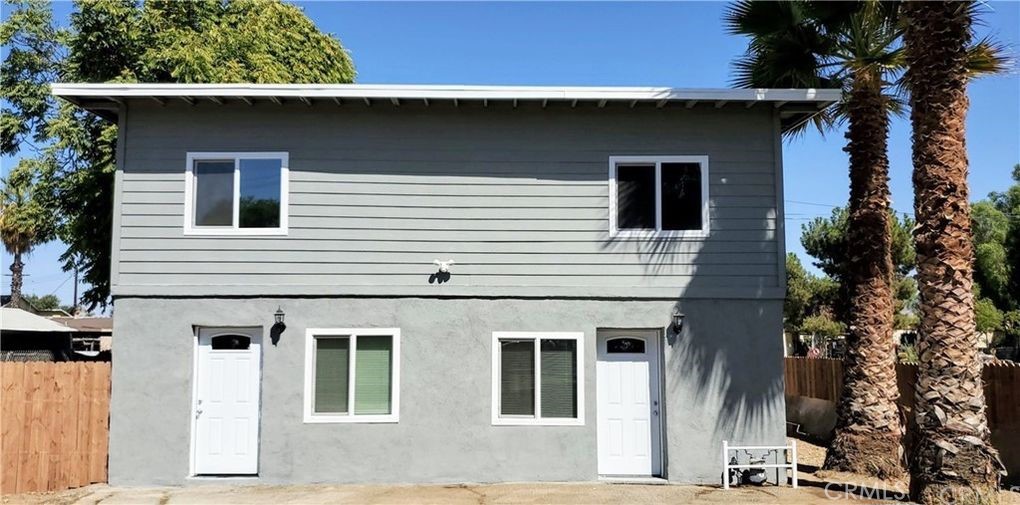 Completely Remodeled and gated Duplex with open floor plan. Unit is 2-bedroom 1 bathroom, with recessed lighting and laminated flooring throughout. Brand new A/C and heating unit. Washer and Dryer hookup. Close to Freeways and Shopping and Dining (Costco, Target, and Mall less than 5 minutes away)