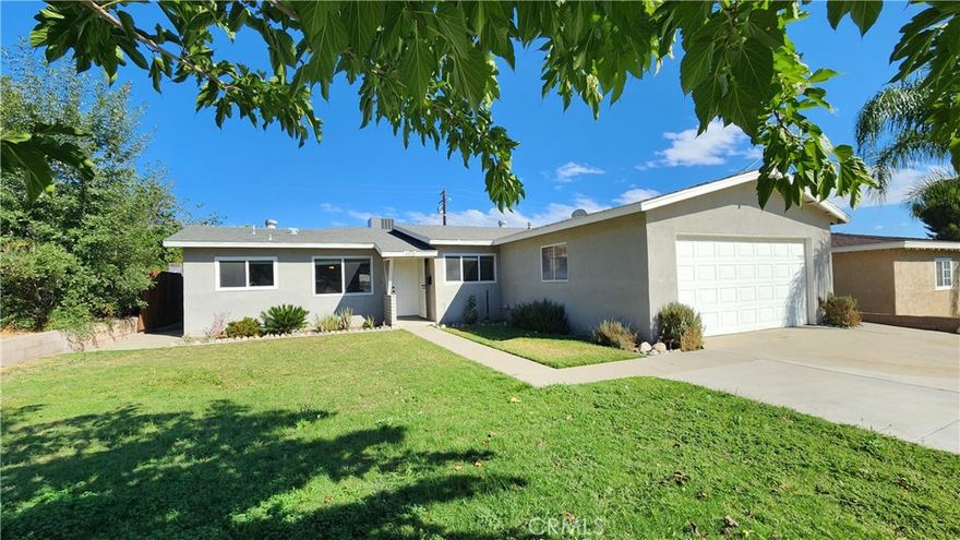 Welcome to your fully-remodeled home on a tree-lined street in the Northpark neighborhood. Cook up a feast in the remodeled kitchen, or enjoy a snack at the breakfast bar. Imagine the memories you can make in that huge living room with a cozy fireplace. Tile flooring throughout is both beautiful and easy to clean. Central A/C and heat, ceiling fans, and dual-paned windows will keep you comfortable year-round. The water-softening system improves dishwasher performance, skin health, and keeping the sink, tub, and shower clean. The covered patio is the perfect place to grill and chill, and the fully-fenced back yard offers a secure space to relax, play, and take in the view of the San Bernardino mountains. The large shed provides a ton of extra storage. Per Google, Cajon High School, Hillside Elementary, Cal State University, two grocery stores, and a variety of other shops and restaurants are less than five minutes away. Schedule your tour today!