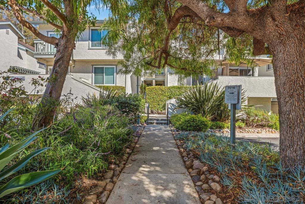 One bedroom townhome with direct entry from attached garage. Park-like peaceful setting with lush trees and flowers that line the street and walkways. Well maintained complex. Great for walking and dog walking! Living room, dining room, kitchen and private balcony are on the main level; bedroom and bath upstairs; garage is downstairs. The attic has pull downstairs for more storage. Full size laundry space in garage with shelving. Lots of guest parking. Complex offers a pool, tennis/pickleball courts.