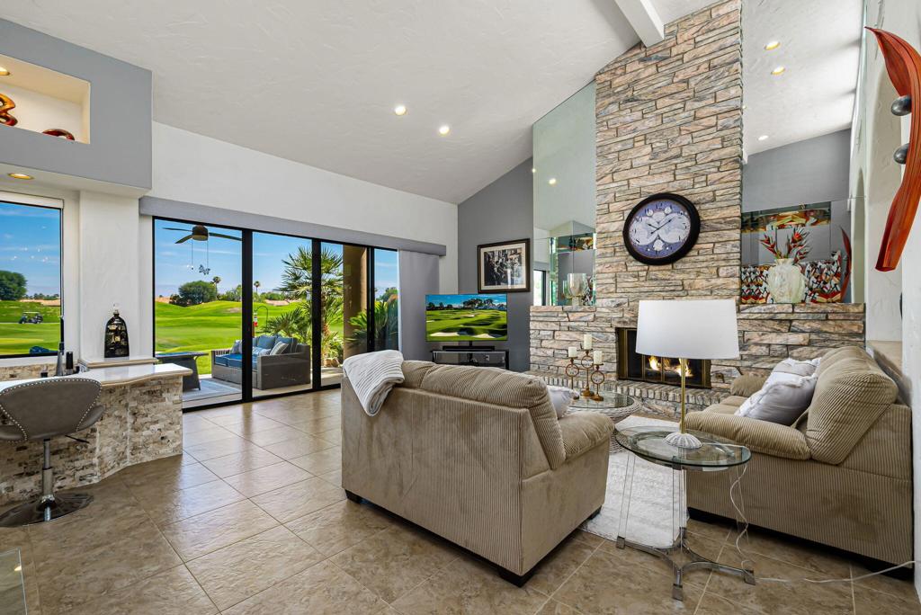LARGE PRICE IMPROVEMENT even with recent additions of new sofa, love seat, chaise lounges, patio chairs, patio table/4 chairs, some updating in primary bath, stack stone in bar area to match fireplace, entry display table, primary bedroom TV. Welcome to PGA West, the Western Home of golf! Enjoy luxury living at its finest in the popular Legends 30 End-Unit Townhome, sporting 2846 Sq Ft, three en-suite Bedrooms, Powder Room, 2.5 car garage, on the #3 Green of the world famous Stadium Golf Course, home of the American Express PGA Golf Tournament each January. Enter through the spacious private courtyard with Southern and Western sun exposure, leading to the large and private rear patio, with an in-ground Spa, two separate sitting areas, a Built-in BBQ, Fire pit, and a great golf course view. Inside it is light and bright. Enjoy the tastefully remodeled Atrium, a step-down large family room with vaulted cathedral ceilings, wet bar, and a cozy fireplace with raised hearth for those cool mornings/evenings. The list of Upgrades/Improvements is too long to list them all(Full list attached in Documents) but a few are:Remodeled kitchen with granite counters, two guest bathrooms and powder room remodeled, Hydro flow electronic water conditioner to entire house, water drop filtration system to kitchen sink, double lift garage openers with wifi on double door, epoxied garage floor, ceramic and stone tile flooring throughout, Atrium remodel, window treatments throughout, Chandeliers, Recent AC/HVAC work including updated ducting through attic, and two ultra violet air scrubbers for HVAC, window Tint on exterior windows, artificial grass in courtyard, roof replaced in 2024. Home is being offered turnkey furnished.I've attached the document for upgrades and improvements.PGA West features 3 Private and 3 Public courses, tennis, pickleball, three clubhouses, restaurants, and more. HOAs include building maintenance, landscaping, irrigation water and equipment, exterior painting, roof maintenance, cable, internet, trash removal, and 24-hour guarded gated security.