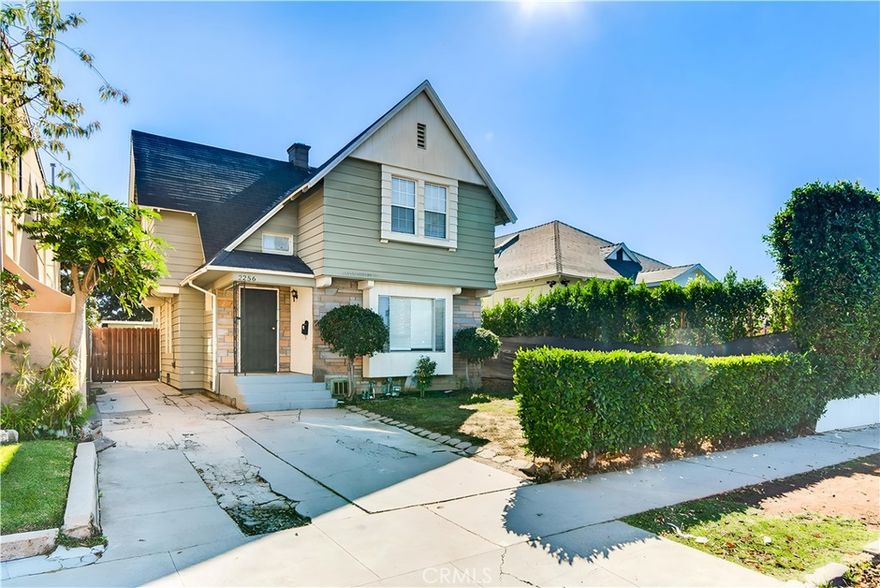 Welcome to 2256 W 28th Street — a stunningly restored Craftsman home in the vibrant Jefferson Park neighborhood of Los Angeles! This timeless 3-bedroom, 2-bath residence blends historic character with modern upgrades, offering the perfect balance of classic architecture and contemporary comfort.



Step inside to a light-filled living room featuring original woodwork, coffered ceilings, and a decorative fireplace that exudes warmth and charm. The spacious dining area flows into a beautifully remodeled kitchen complete with quartz countertops, stainless steel appliances, and custom cabinetry — ideal for home chefs and entertainers alike.



The primary suite offers a serene retreat with an updated en suite bathroom and ample closet space. Two additional bedrooms provide flexibility for guests, a home office, or creative studio. Both bathrooms have been tastefully renovated with designer finishes and modern fixtures.



Outside, enjoy a private backyard oasis perfect for outdoor dining, gardening, or weekend gatherings. The long driveway and detached garage offer plenty of parking and potential for an ADU (buyer to verify).



Located on a tree-lined street just minutes from USC, Exposition Park, the Metro Expo Line, and DTLA, this home delivers historic charm, urban convenience, and lasting value in one of LA’s most sought-after historic districts. Move right in and experience the best of Los Angeles living!