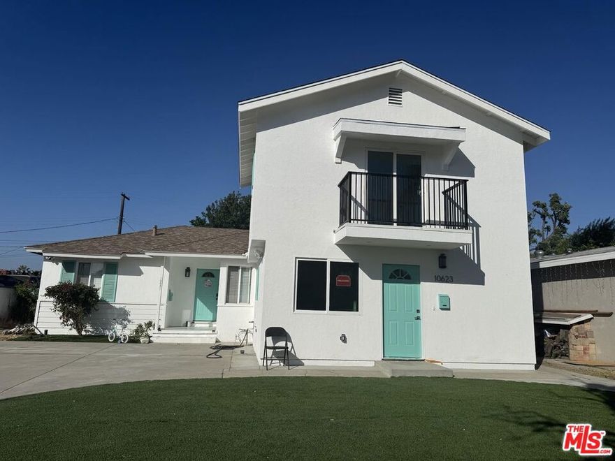 Conveniently situated in the heart of Mission Hills, this beautifully built and completely new 1-bedroom, 1.5-bath ADU offers modern living in a peaceful residential setting close to shopping, dining, parks, and the 405, 118, and 5 freeways. This townhome-style unit features a bright and contemporary two-story layout with an open-concept living area downstairs and a private bedroom suite upstairs. The stunning modern kitchen comes equipped with brand-new appliances including an electric range, built-in microwave, stylish refrigerator, dishwasher, quartz countertops, and white shaker cabinets with ample storage. The home is filled with natural light and complemented by recessed lighting, large windows, and light-colored hardwood-style flooring that create a warm and inviting atmosphere. Upstairs, the bedroom offers mirrored wardrobe closets, sleek black railing accents, and direct access to a private balcony through sliding glass doors. Both bathrooms are updated with clean, modern finishes, and the unit includes new electrical, HVAC vents, and energy-efficient lighting for added comfort. The private upstairs balcony provides a relaxing outdoor space, completing this thoughtfully designed and move-in-ready Mission Hills gem