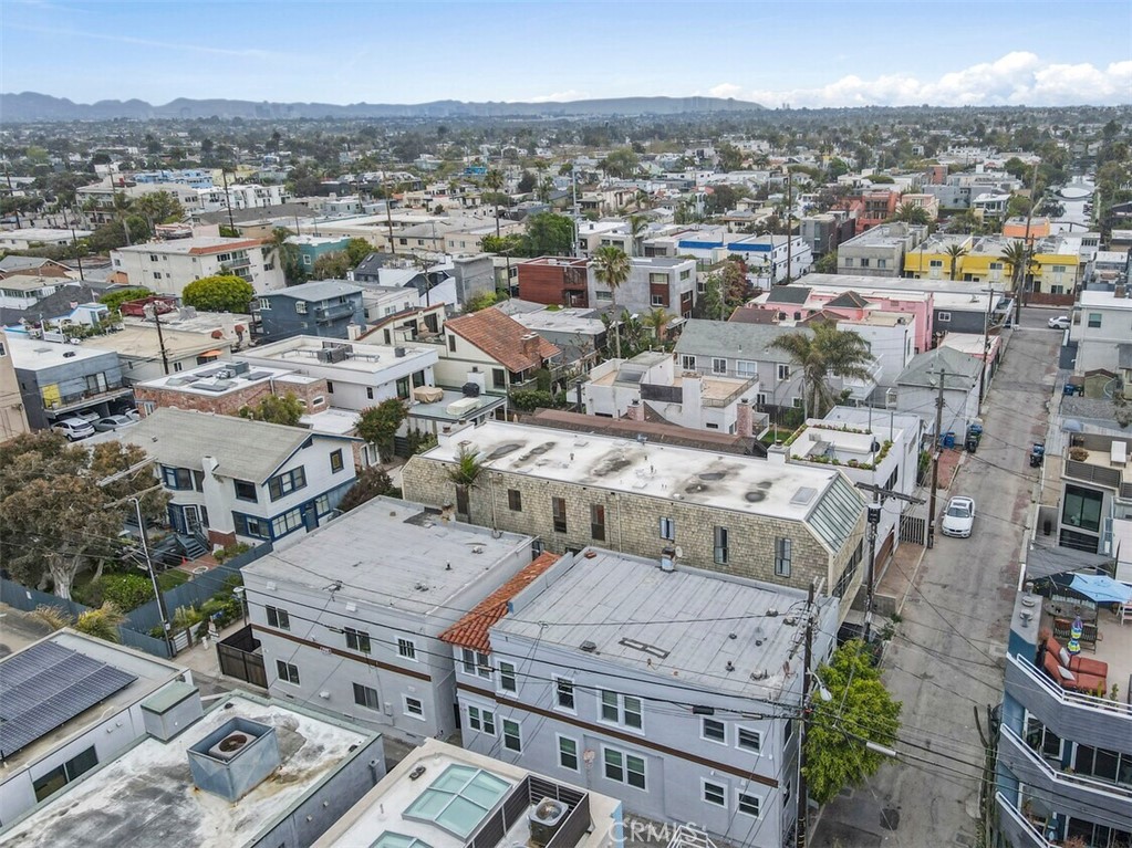 Each 4-plex can be financed separately ! Side-by-side 4-plexes right on the beach! 12-12.5 25th Pl,
Venice is a prime opportunity for any buyer looking to
take advantage of residential financing and own in an A+
neighborhood. 7/8 units have been extensively renovated.
Each unit offers comfortable living spaces and modern
amenities, ensuring a desirable rental experience for
tenants. Most units are renovated and some units have
ocean views! Currently, a majority of units are rented at
near-market rents and the property collects a gross
income of $247,980 annually.
Whether you're looking to expand your investment
portfolio or seeking a lucrative income-generating
property, this offering stands as a testament to the allure
of coastal California living combined with the promise of
substantial financial returns.
12-12. 25th Pl is located in the heart of Silicon Beach, an
area that has attracted a wide range of technology
companies including Facebook, Google, and Snapchat.
Residents enjoy the benefits of living in the heart of Venice
as the property is close to Abbot Kinney, Santa Monica
Pier, and much more.