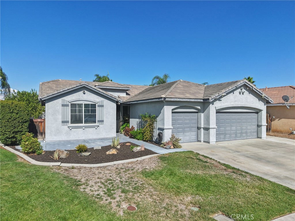 Welcome to this inviting single-story home on a quiet cul-de-sac in a desirable neighborhood. This home is a blend of spacious and comfortable living areas. Enjoy a large kitchen that's made for gathering, Complete with a center island, ample counter space, and plenty of cabinet space. Right off the kitchen, you'll find a convenient indoor laundry room. The primary bedroom is spacious and private with its own en-suite bathroom and generous closet. The en-suite bathroom offers a walk in shower, and separate garden tub. Three additional bedrooms and full bathroom are locatedd on the opposite side of the home, lots of privacy and flexibility. Step outside to a private backyard and you'll find a large covered patio great for relaxing and lounging year-round. Don't miss the cute little tiny shed, ideal for your creative use, workshop or even extra storage. The 3-car garage provides all the space you need for vehicles, toys, or even a workshop. Close proximity to schools, parks, shopping, restaurants, and freeway access.