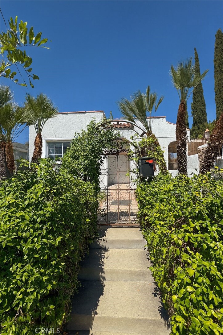 North Hollywood gem! Freshly renovated 3-bed, 2-bath with a bright, open layout perfect for entertaining. Enjoy vinyl plank flooring throughout, a brand-new A/C, quartz countertops, and all-new appliances. Charming exterior features include a gated entrance, tranquil water feature, covered patio, and lush mature foliage. The large spacious patio also offers a firepit to gather around on those chilly nights with friends or making s'mores for a treat. The home also comes with solar—please inquire for details. The showstopper is the possible ADU—the garage offers excellent potential to convert to living space for rental income, multigenerational living, or a private office, or easily restore to car storage with a simple door install. Endless possibilities in a prime Valley location—schedule your showing today! Buyer to verify all permits, zoning, and ADU feasibility with the City.