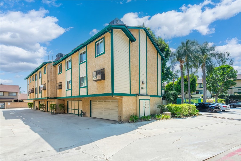 Great location close to beautiful downtown Monrovia, this unit is located in a meticulously maintained complex with a resort size pool and BBQ area for
entertaining. This townhome is spacious, bright, and situated in a quiet location at the rear of the complex. Upon entry you are greeted by a large formal living room with a fireplace and adjacent dining area. There are 3 bedrooms including a spacious master suite and two full baths on the upper level. There is a convenient half bath on first level. The large Master bedroom features a spacious closet and cathedral ceilings. With brand new flooring and fresh paint throughout this townhome is move-in ready. The laundry and extra storage are conveniently located in the attached two car garage. There is plenty of guest parking as well. Great value for a quality home in a fantastic location. Convenient to shops, restaurants, the Metro Gold Line station and easy access to the 210 and 605 freeways. HOA fees includes earthquake insurance, parking patrol, trash, interior water and common area maintenance.
