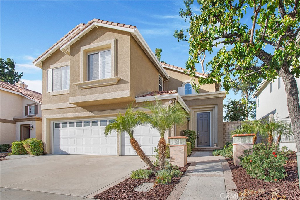 Spacious Two-Level Condo in Desirable Placentia Community! Welcome to this perfect two-level unit located in the highly sought-after Madrid at Alta Vista community in Placentia. This beautifully maintained 3-bedroom, 2.5-bathroom home offers 1,890 square feet of open and inviting living space.
Enjoy a bright and airy layout featuring a spacious family room, an upstairs loft, and generously sized bedrooms. Elegant wood flooring runs throughout the main living areas, and the home includes a large back patio, perfect for entertaining or relaxing outdoors. The rare 3-car garage provides ample parking and storage space. Residents of Madrid at Alta Vista enjoy access to award-winning schools within the Placentia-Yorba Linda Unified School District, and are just minutes from the Placentia Champion Sports Complex, shopping, dining, and more. Don’t miss this opportunity to live in a well-established neighborhood with everything you need just moments away!