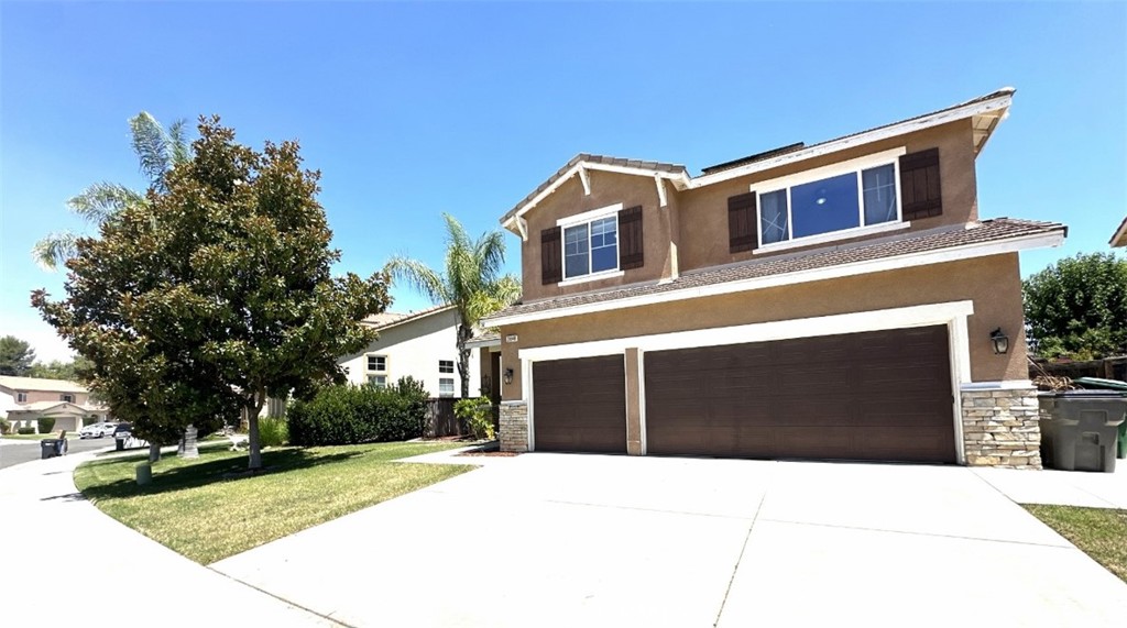 WELCOME TO YOUR BEAUTIFUL NEW HOME LOCATED IN THE WONDERFUL CITY OF MENIFEE!!!!!! Upon entering you are greeted immediately by radiant wood floors all throughout and vaulted ceilings above the formal living room and dining room. This leads you right into a large open concept bright kitchen, with stainless steel appliances that overlook a cozy fireplace and family room where you will undoubtedly want to spend many nights with your family. The main floor has a bedroom and full bathroom for your friends and family whenever they come and visit. The Large Primary Suite is flooded with tons of natural light. Bath includes dual sinks, walk-in closet, stand up shower, and soaking tub! The backyard has a nice outdoor patio space with lattice. There is a dog run on one side of the yard along with a protected garden area for you to plant vegetables on the other side. The large 3 car garage has plenty of space for 3 vehicles or a workshop. LOCATED JUST MINUTES FROM COMMUNITY PARKS, SHOPPING, WALKING TRAILS, MENIFEE LAKES GOLF CLUB, AND SO MUCH MORE!!!!! Rent includes solar provided by the owner, plus gardener, plus kitchen appliances & washer/dryer (without warranty). Tenants pay for other utilities and services. Pets / animals considered case-by-case. No smoking anywhere on the property. MAKE THIS YOUR HOME TODAY!!!!!!!!!