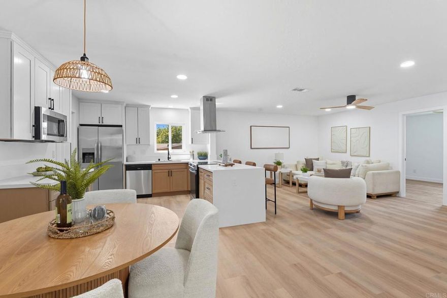 Welcome to this stunning, fully reimagined home, where modern design meets everyday comfort on an expansive, versatile lot. Thoughtfully remodeled, this home offers a bright, open-concept layout with custom finishes, and a fresh sense of style throughout.  The chef-inspired kitchen is the centerpiece of the home, featuring sleek quartz countertops, shaker-style cabinetry, and stainless steel appliances—perfect for entertaining or enjoying quiet nights at home. Natural light floods the living spaces, highlighting wide-plank flooring, designer lighting, and carefully curated fixtures that give the home a cohesive and elevated feel.  Step outside to a rare oversized lot—offering ample parking for RVs, boats, or outdoor toys, plus plenty of room to add a pool, ADU, or guest house. Whether you're looking to expand, generate rental income, or create the ultimate backyard oasis, this property provides endless potential.  Tucked in a quiet, established neighborhood with convenient access to schools, parks, shopping, and major freeways, this home delivers the perfect balance of location, lifestyle, and future flexibility.  Don’t miss your chance to own a move-in-ready home with space to grow and style to spare—schedule your showing today!