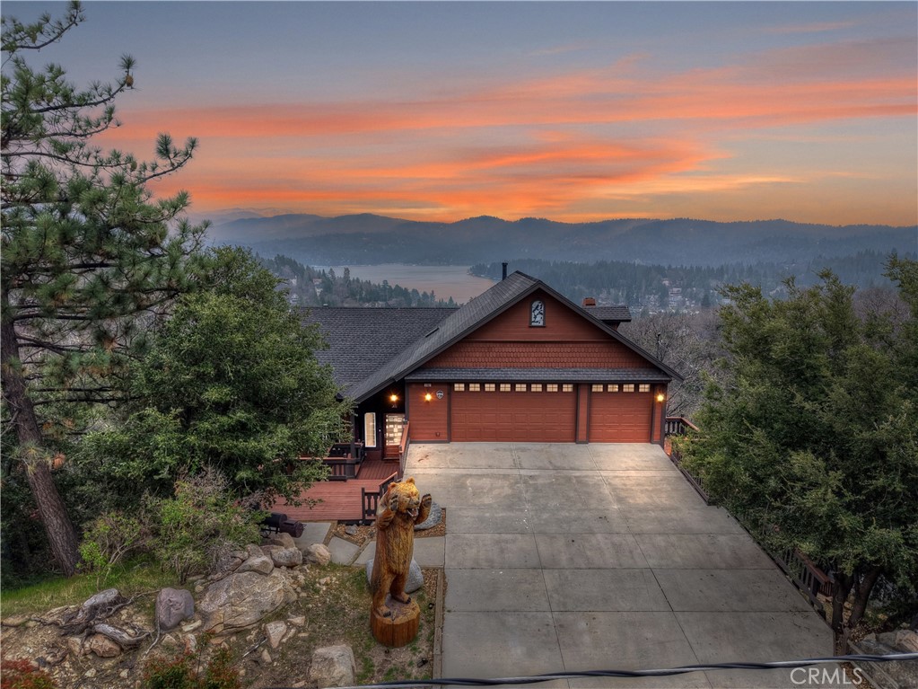 Grand Lake Arrowhead Lodge with Panoramic Views – Turn-Key Perfection
Prepare to be wowed from the moment you enter this stunning 4500sq' lodge-style mountain home—where massive panoramic lake views make a grand first impression. Designed for those who love to entertain and unwind in style, this 5-bedroom, 5-bathroom retreat offers comfort, space, and unforgettable scenery. Enjoy four cozy fireplaces, including one in the elegant billiards room (with its own deck!) and a romantic two-way fireplace in the primary suite, opening to a spa-inspired bathroom. Each of the 5 bedrooms offers privacy and luxury for guests or family. The heart of the home is an oversized chef’s kitchen featuring Viking and Sub-Zero appliances, double ovens, wine fridge, and granite countertops—perfect for hosting big gatherings or intimate dinners. Open floor plan with everyone's favorite "Great Room" style with kitchen opening to living & dining rooms. Extra large deck to enjoy those incredible views and build some terriffic memories! An oversized 3-car garage and extra-deep driveway provide plenty of room for guests, plus space for a boat trailer so you can take full advantage of your private lake rights to Lake Arrowhead’s pristine waters and beaches. Offered fully furnished, professionally decorated, and completely equipped, this turn-key home has it all: inside laundry, public utilities, high-speed internet, and year-round access via plowed, maintained roads. Believe it or not only $311/sq' for all of this.. what an opportunity!! ** Owner willing to carry loan on approved financials **
This is more than a home—it’s a mountain lifestyle with a view to match