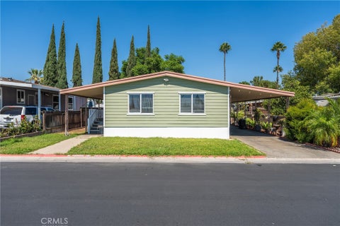 Photo of 1025 S Riverside Avenue #121, Rialto, CA 92376 (MLS # CV26206992)