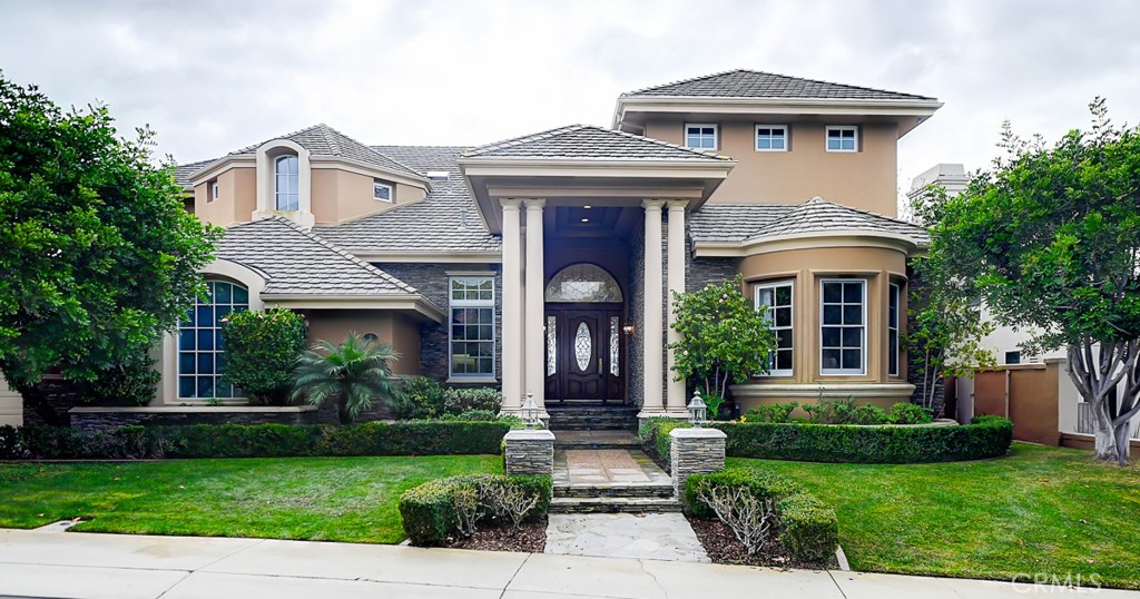 This stunning custom home, boasting beautiful views of the ocean, sunsets, and city lights, is located in the prestigious guard-gated community of Ocean Ranch. The lease term is negotiable as long as it is longer than one month. The property features two primary suites on the upper-level, all positioned to take advantage of the spectacular views. A third primary suite also with ocean view is on the main-level, with a fourth main-level en-suite bedroom. The upper-level theater can be converted to a fifth bedroom with its own bathroom just cross the hall way. Designed for luxury and convenience, the home includes an elevator, a dedicated office, a gym, a powder room, a wet bar with a wine cellar, foyer, two fire places, two balconies, living room, family room, complemented by extensive built-in cabinetry and shelving. The spacious kitchen is equipped with a center island, quartz countertop and a walk-in pantry. The backyard is an entertainers dream, featuring a pool and spa, a fireplace, a fire pit, and a barbecue island. Ocean Ranch offers a prime location close to top-rated schools, shopping centers, fine dining, and beautiful beaches.