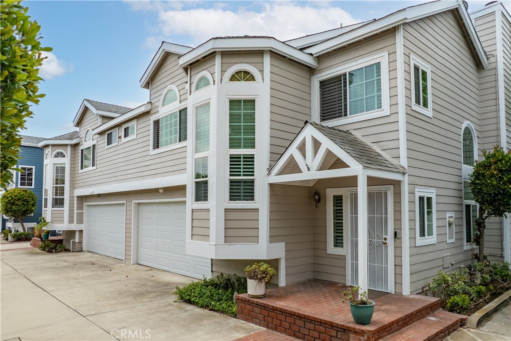 Welcome to this beautifully updated 3-bedroom, 2.5-bath home located in the desirable Cabot Cove community of Costa Mesa. This light-filled property features soaring vaulted ceilings, large arched windows, and plantation shutter blinds throughout. The interior and exterior have been freshly painted, creating a clean and inviting atmosphere. The kitchen offers ample cabinetry and counter space, opening to a spacious living area with a cozy brick fireplace.
Upstairs, you’ll find a versatile loft area that’s perfect for a home office, reading nook, or creative space. Step outside to your private patio, ideal for relaxing or entertaining, especially during the warm summer months. Whether you're enjoying a quiet morning coffee or hosting a weekend barbecue, this outdoor space offers the perfect extension of your living area.
Additional features include a 2-car attached garage and a functional floor plan designed for comfortable everyday living. Enjoy a prime location just minutes from The Triangle, the OC Fairgrounds, Newport Beach, local dining, and easy freeway access.
This is a wonderful opportunity to own a move-in ready home in a sought-after Costa Mesa neighborhood.