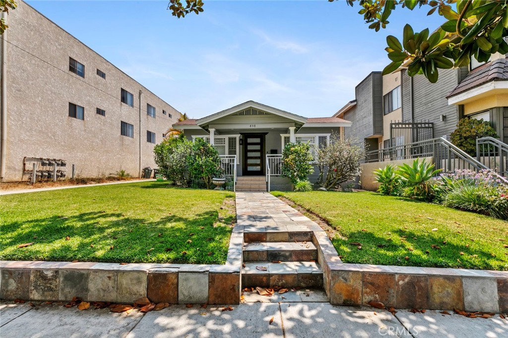 Nestled in one of the most desirable neighborhoods in Glendale, this beautifully renovated single-family home effortlessly blends comfort, style, and convenience. Boasting an adaptable floor plan, this inviting residence offers 2 spacious bedrooms and 1.5 modern baths—with the option to convert into a 3-bedroom layout, ideal for families or those seeking extra space. Step inside to discover an inviting, move-in-ready interior adorned with brand new vinyl flooring, fresh designer paint, and elegant recessed lighting throughout. The generous bedrooms provide ample comfort and natural light, while the expansive kitchen is perfect for both casual meals and entertaining guests. Enjoy California living in the large, private backyard—a perfect oasis for relaxing, gardening, or hosting gatherings. You'll love the easy access to major freeways, plus you're just moments from Glendale’s premier shopping centers, restaurants, and everyday amenities. Don't miss this rare opportunity to call one of Glendale’s best areas home. Make 408 W Dryden Street yours today!