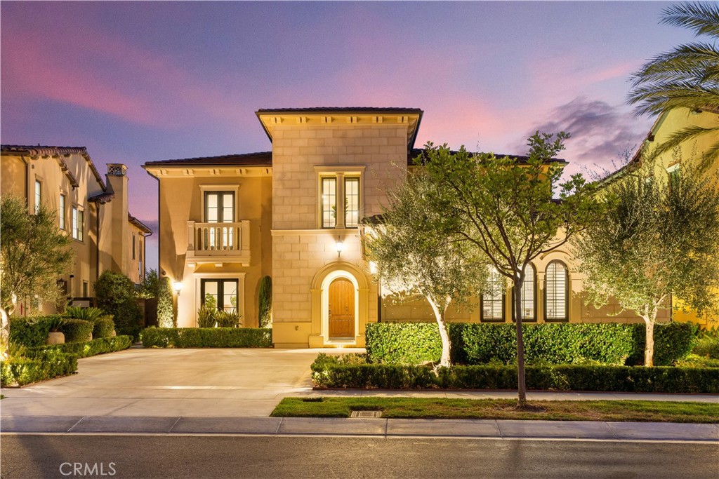 Welcome to Bella Vista in Orchard Hills, Irvine - an exclusive enclave where sophistication meets comfort. This 5-bedroom, 5.5-bathroom estate spans approx. 4,884 sqft and showcases luxury design, modern upgrades, and smart-home convenience in a prime guard-gated community. From the moment you arrive, the home's presence is undeniable. An extended driveway accommodates up to six vehicles, leading to a 3-car garage. Inside, a grand foyer welcomes you with soaring ceilings, upgraded marble flooring, and a striking mosaic design. A sweeping staircase and rich wood flooring set a warm yet refined tone that flows throughout the home. At the heart of the residence lies a chef's kitchen designed for culinary excellence. outfitted with quartz countertops, Sub-Zero refrigeration, Wolf appliances, Bosch dishwasher, wine fridge, farmhouse sink, and oversized island, it is as functional as it is stylish. A butler's pantry and walk-in pantry provide ample storage, while the open-concept design connects seamlessly to the great room, dining area, and nook-perfect for entertaining. The main level also features a private guest suite with ensuite bath and access to a serene outdoor patio. Upstairs, a spacious loft opens to a balcony with upgraded flooring and sweeping city light views. The primary suite is a true retreat. Enter through a medallion marble foyer into a space enhanced by a see-through fireplace and a California closet walk-in wardrobe. The spa-like bathroom, marble flooring and walls, a freestanding Soaking tub, and an oversized walk-in shower. Two additional ensuite bedrooms and converted office with premium California Closet built-ins provide comfortable private spaces. Designed for outdoor living, the backyard is an entertainer's dream. A California-style outdoor room with electronic shade. a built-in barbecue station with cooktop, fridge, sink, and beverage drawers, plus a gazebo and fountain, create the perfect gathering space. Lush landscaping and fruit trees complete this private retreat. Modern convenience include a Control4 smart home system. owned solar. soft water system, hunter-Douglas wood shutters. Ethan Allen draperies. With top-rated restaurants, Asian market, and shopping within walking distance, plus resort-style community amenities, this home offers elegance, comfort, and lifestyle in one of Irvine's most desirable neighborhoods.https://vimeo.com/1119817919