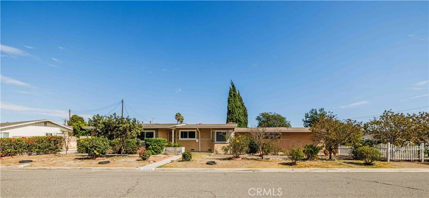 PRICE REDUCTION !!! Spacious Home nestled in a highly sought after neighborhood just minutes away from Magic of Disneyland and Little Saigon.  Beautiful Corner Lot home with Two (2) oversized driveways ~ One with a long drive-way leads into an attached Two (2) cars garage located on La Grand Ave and One with an extra long drive-way for  RV parking located on Homeway Dr.  This is a cozy home with Three (3) Bedrooms, Two (2) bathrooms, Huge Bonus room and an extra room located on the side of the garage.  Enter into an exquisite home with an Open Floor Plan ~ spacious Bonus Room offering flexibility for an Office, Bedroom or an entertainment room.  Cozy Fireplace in the Dining Room leads into a Breakfast Nook and beautiful Kitchen.  All spacious Three (3) Bedrooms and Two (2) Bathrooms with Central Heater/Air, hardwood flooring and Recessed Lighting thru out the house.  Additional Room on the side of Garage which can convert into another Bedroom with separated access.  An opportunities are endless with the expansiveness of this corner lot are ready to unlock their full potential.  Located within a prime location close to major attractions, shopping, dining and freeway access.  This is a Must See Home in an Excellent Location.