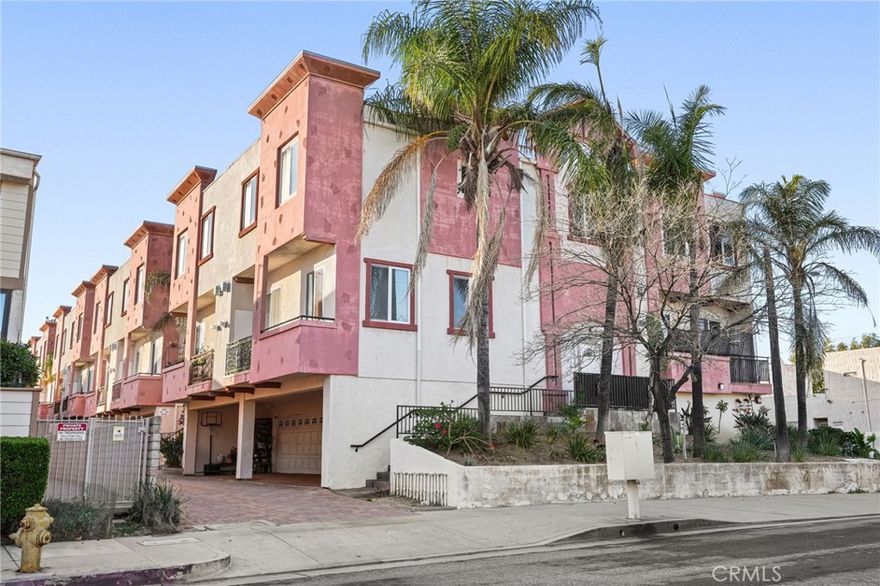 Welcome to this spacious and beautifully maintained tri-level townhouse offering over 2,300 sq. ft. of comfortable living space with 3 bedrooms and 2.5 bathroom. Built in 2009, this newer construction home combines modern design with everyday functionality, perfect for both comfort and convenience. The main living level features soaring high ceilings, a bright and open floor plan and a large living room with a cozy fireplace, recessed lighting and laminate flooring. Step out onto the private patio, ideal for relaxing or entertaining guests. The chef’s kitchen is equipped with rich cabinetry, granite countertops and plenty of prep space. A powder room and a separate laundry room with storage complete this level. Upstairs, you’ll find a versatile open loft perfect for a home office, gym, or lounge along with two spacious bedrooms that share a beautifully updated full bathroom. The primary suite is a true retreat, offering high ceilings, a ceiling fan, a large walk-in closet and a large ensuite bath with a jacuzzi tub and separate shower. The lower level includes a generous bonus room with ample storage cabinets and direct access to the attached two-car garage, which easily fits two vehicles. Located in a desirable Chatsworth neighborhood, this home offers easy access to parks, shopping, dining, and major freeways all while nestled in a quiet, well-maintained community.