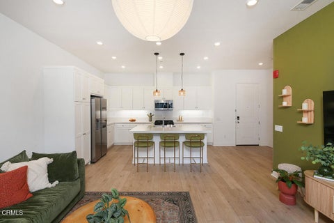 Photo of 27212 Diamond Peak Lane #301, Valencia, CA 91381 (MLS # P1-28965)