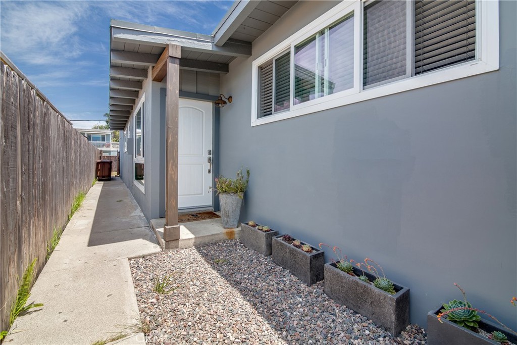 Lower level 2 bedroom 1 bath unit situated within a triplex. Just a few blocks from the beach. This unit boasts a recently updated trendy kitchen with quartz counters, PEX plumbing, beautiful tile flooring, skylights, vaulted beamed ceilings, an open floorplan and its own spacious, private patio. Additional updates to the building include exterior stucco and wood beam ceilings have been redone, newer exterior paint, double paned windows and newer water heaters. Stackable washers and dryers inside and a one car garage found in the back of the building accessed through the alley. Walk to most Beaches San Clemente has to offer!