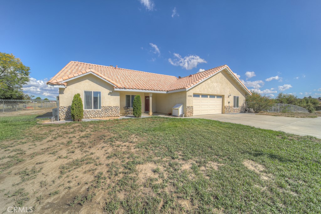 This custom-built home on 2.75 usable acres is located close to the beautiful lake with trails and picnic areas! Lots of room for horses with endless trails directly from your property. This parcel is recently fenced from the house back to the property lines with lots of room for the pups to run! Lawn and planted baby trees with sprinkler system, some mature trees and a long concrete driveway. Lots of space for RV or Boat parking. The home offers 5 bedrooms and 3 bathrooms. One of the bedrooms is separated from the house by the garage and has it's own bathroom and exterior door to the rear yard. There are 4 bedrooms in the main part of the home with the primary wing on one side and the additional 3 bedrooms and full bath off of the hall on the opposite side. The kitchen offers space for a large formal dining table, the living room has a wood burning fireplace and sliding doors leading to a covered porch and rear yard separately wire fenced off for kiddos or pets (or.....). Due to easements, nobody will ever build to the South of this parcel so the back yard feels private and expansive. There is an auto start Generac generator that needs minor repair and the laminate floor in the primary was not properly installed so the seller is offering a $4,000 credit to remedy these items. The Lake Riverside Estates community is a rare gem in So Cal located just 25 min outside of Temecula and offers miles of trails, direct access to national forest trails, private lake, community equestrian arena and round pen, private paved and lighted airstrip, community pool, sports courts and tot lot, and HOA maintained roads. Cal Fire is located within the community. Nearby areas include Temecula Wine Country, Idyllwild, Julian, Borrego Springs and Palm Desert. Truly the last frontier in So Cal with some seasonal weather, big beautiful blue skies and room to roam and breathe. Concrete tile roof and stucco with stone finishes. Come and See!