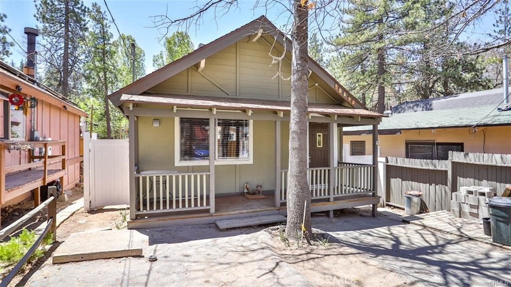 ** For sale or Rent ** Charming and spacious 2-bedroom, 1-bath cabin in Arrowbear with an open-concept layout. The inviting living room boasts a cozy fireplace and upgraded bamboo flooring, while the kitchen features elegant granite countertops and rich cherry oak cabinetry. Fresh paint throughout and upgraded vanities in the bathroom enhance the cabin's appeal. Step outside to the expansive 30x15 deck, perfect for enjoying Arrowbear's serene weather with your morning coffee. Located just 6 miles from Santa’s Village, with easy access to Lake Arrowhead, Big Bear Lake, and only 14 miles from the 210 freeway. Plus, the cabin is EV charge-ready for your convenience!