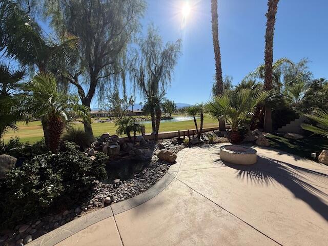 South facing golf course Furnished Castellano Model with 2230 sq. ft. with Hot Tub, fire pit and water feature. Very nice cozy private back yard with mature Palm trees. Large Kitchen with Dining nook, Island and Breakfast bar. Large Great Room, separate form dining room, Den-office, and Laundry room. 2 Plus golf cart Garage.