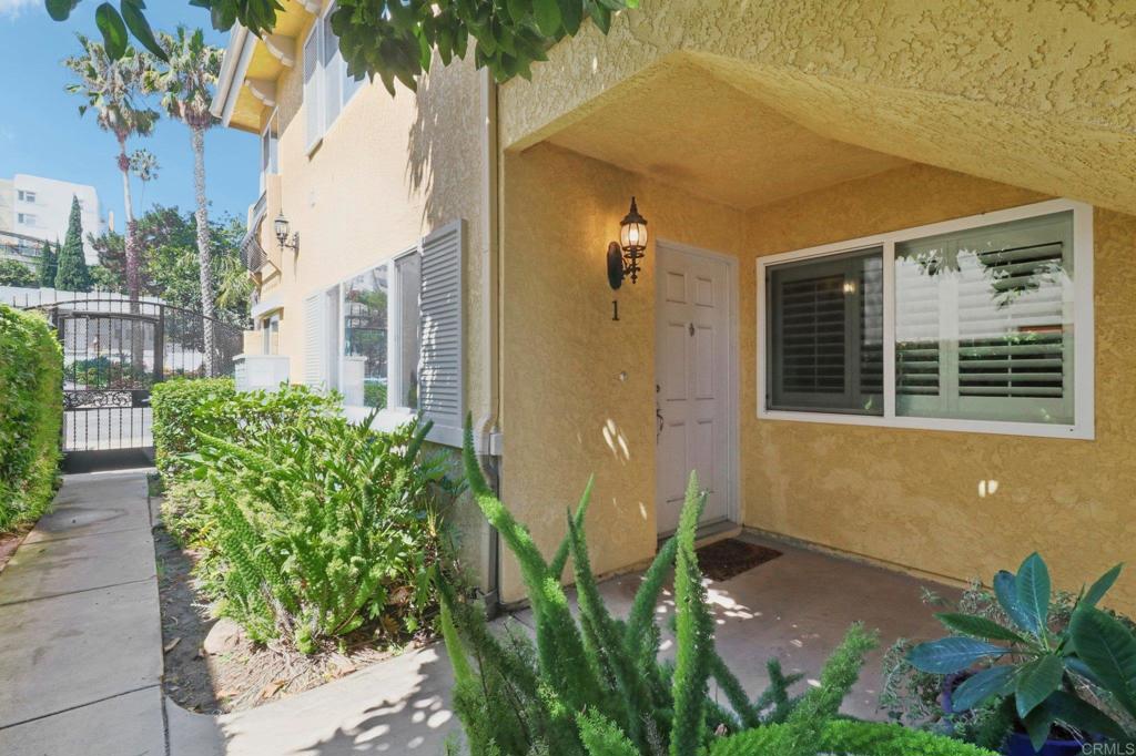 Indulge in vibrant North Park living from this rarely available ground-floor corner condo — quietly tucked away within a gated 10 unit complex and perfectly positioned just steps from shopping, dining, and entertainment. The striking and light-filled layout affords a 2-bedroom, 2-bath residence designed with abundant windows, tranquil courtyard, and an open flow that combines everyday comfort with urban convenience. Step inside and admire the beautiful flooring, bright natural light, and thoughtful upgrades throughout. The kitchen is equipped with granite counters, ample cabinetry with under-cabinet lighting, and stainless steel appliances including a new refrigerator — seamlessly connecting to the dining and living areas. The serene primary suite boasts patio access, a spacious walk-in closet, and an ensuite bathroom, while a secondary bedroom and full bath create flexibility for guests or a home office. Both bedrooms feature ceiling fans, and the home is complete with in-unit laundry for added convenience. Additional highlights include assigned parking, low HOA fee and strong reserves, and a charming courtyard setting that enhances the home’s unique architectural feel. Homeowners Association fee covers water, trash, landscape and building maintenance. All this in one of San Diego’s most desirable neighborhoods — North Park — where walkability meets style and convenience. Just outside your door you’ll find iconic landmarks like the newly reimagined Lafayette Hotel, vibrant coffee shops, craft breweries, boutique fitness studios, and some of the city’s best dining destinations. With Balboa Park, downtown San Diego, and major freeways only minutes away, this condo places you at the center of it all. **approved complex for VA Financing**