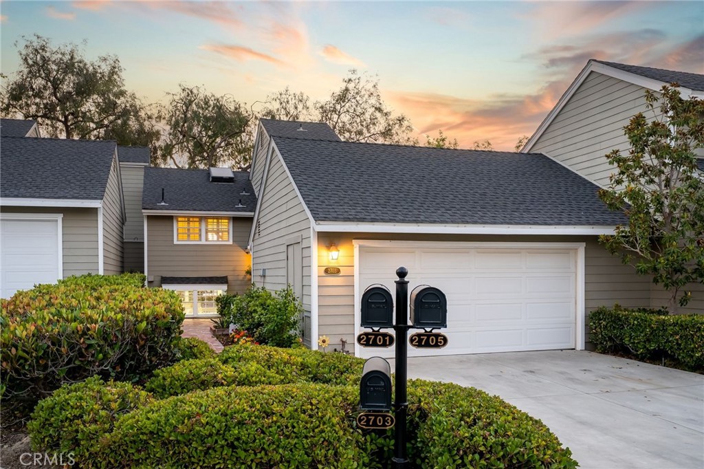 Welcome to this highly upgraded two bedroom (with flex-space unit) in Harbor View Knoll, a lovely community in the heart of Newport Beach. This peaceful neighborhood features 64 Cape Cod-style townhomes, offering a fantastic living experience within the highly regarded Andersen Elementary and Corona Del Mar High School districts. Conveniently located just steps from local shops, a vibrant shopping center, and only a block away from a beautiful park, Harbor View Knoll blends both ease of access and tranquility. Upon entering, you’ll be welcomed by a large foyer that leads to a private outdoor atrium—ideal for moments of quiet relaxation. The spacious floor plan includes an upstairs Primary bedroom with vaulted ceilings and an en-suite bathroom with new vanity, as well as a secondary bedroom and bathroom. Downstairs, the flexible layout offers a room that can be used as an additional bedroom, office, or den to suit your needs. The open concept living, dining, and kitchen areas flow effortlessly, with views of the community’s lush greenery and peaceful courtyard. A large kitchen opens up to the dining and living area with wall to wall hardwood floors, brand new cabinets, stainless appliances, new countertops, new lighting, and a sliding glass door that opens to a private patio. Large windows throughout the home allow plenty of natural light to fill the space, creating a bright and airy feel. The formal living room features vaulted ceilings and a charming fireplace, while the dining room extends to a west-facing private balcony. Additional highlights include an oversized garage with built-in cabinetry and generous overhead storage. Harbor View Knoll sits on 15 acres of beautifully maintained greenbelt, offering both privacy and access to community amenities such as a pool. Harbor View Knoll is truly one of Newport Beach’s hidden gems.