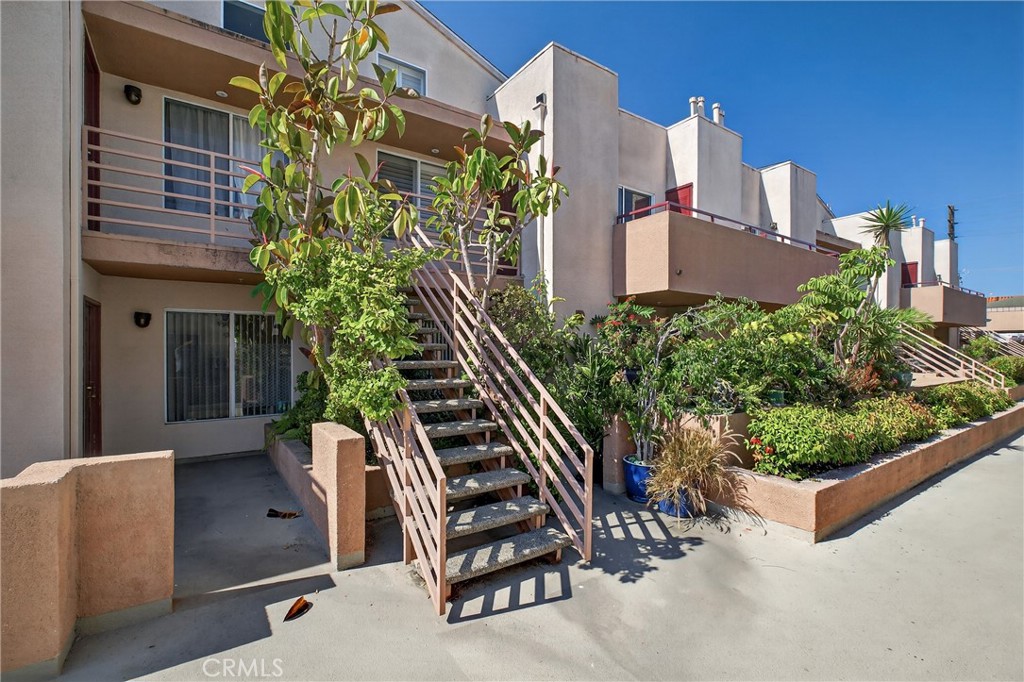 Welcome to 16700 Yukon Ave #218 – a bright 2-bedroom, 2-bathroom top-floor condo in the heart of Torrance! This well-maintained home features vaulted ceilings, beautiful plantation shutters, and a practical layout with great natural light throughout. Freshly updated with new paint, lighting, and carpet, the home is move-in ready while offering the opportunity to personalize further. The living room includes a fireplace and custom built-in cherrywood shelving. The kitchen has engineered hardwood floors, newer microwave/dishwasher, and plenty of cabinet space, while the adjacent dining area opens to the first balcony ideal for outdoor dining or a BBQ. Both bedrooms feature custom California Closets systems, and the primary suite includes a private bath and dual closets. Enjoy in-unit laundry, central A/C, and skylights in the kitchen and hallway, bringing in extra sunshine. The second bedroom has its own balcony with a view of the Palos Verdes hillside. There’s storage throughout—including two extra closets in living and dining room as well as a storage unit in the garage. The unit comes with two assigned parking spaces in a secure garage and is located in a well-maintained community with easy access to shopping, dining, and freeway connections. A fantastic opportunity for first-time buyers or those looking to downsize without compromise!