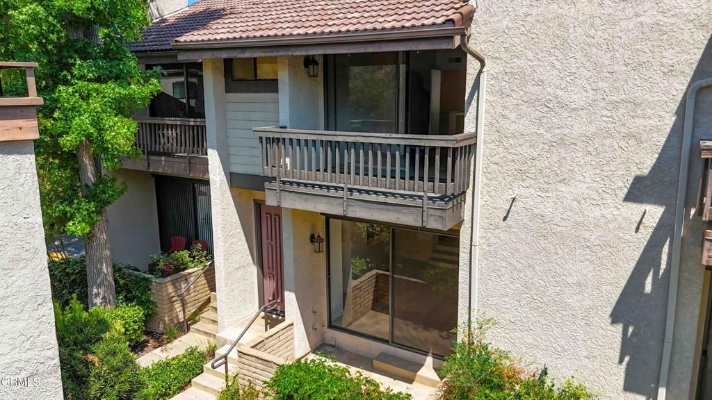 Photo of 21801 Burbank Boulevard #74, Woodland Hills, CA 91367 (MLS # V1-31888)
