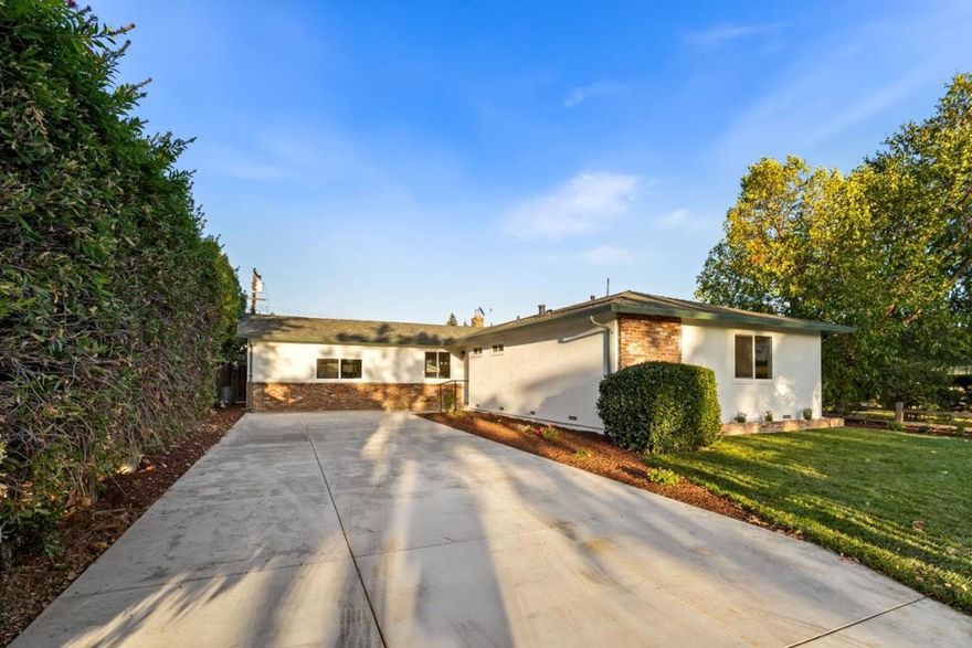Beautifully renovated home featuring brand new engineered hardwood flooring, a modern kitchen with quartz countertops and stainless steel appliances, and an updated bathroom with stylish finishes. Bright and open layout enhanced by recessed lighting throughout. Enjoy stunning curb appeal with fresh landscaping and a new concrete driveway. Move in ready and designed for comfortable, contemporary living!