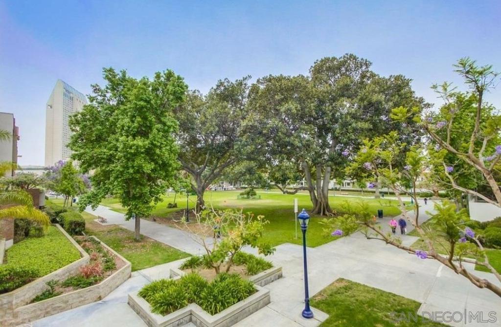 Experience year-round resort-style living at Park Marina, a charming low-rise community in the heart of downtown. This quiet, garden-facing condo offers a peaceful retreat with a thoughtfully designed floor plan featuring in-unit washer/dryer in a dedicated laundry closet and a spacious master closet with custom organizers. Enjoy an abundance of natural light and a breezy, open feel throughout. The building boasts top-notch amenities including a fitness center, pool, Jacuzzi, dry sauna, EV charging station, and ample underground guest parking. Just steps from Pantoja Park, Ralphs, Harbor Drive, the Convention Center, Seaport Village, and both state and federal courthouses, this location offers unbeatable walkability. Skip the high-rises and enjoy the comfort of a well-maintained, quiet community with lush landscaping and convenient access to everything downtown San Diego has to offer. Welcome to Park Marina — vacation-style living every day!