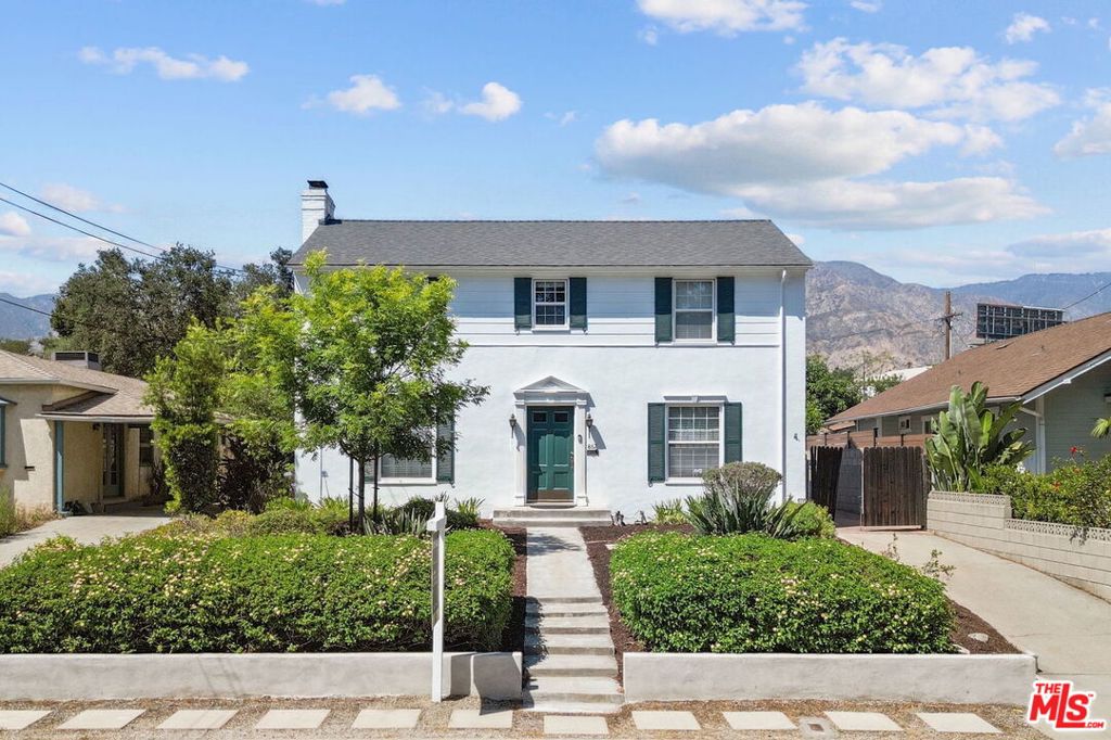 Welcome to 867 New York Drive, a beautifully maintained 1930s Colonial-style home that effortlessly blends timeless elegance with thoughtful modern updates, nestled on one of Altadena's most vibrant and picturesque streets. This spacious 4-bedroom, 3-bathroom residence also includes a dedicated office and an enclosed sunroom, offering approximately 2,106 square feet of interior living space, plus an additional ~454 square feet of bonus room for year-round enjoyment.Warmth and character radiate from the moment you enter, with real wood floors underfoot and classic architectural details throughout. The inviting formal living room centers around a charming fireplace and opens into the sunroom, where tall windows and tiled floors bathe the space in natural light. The formal dining room, ideal for gatherings, connects directly to the sunroom, creating a seamless flow between spaces. Step outside into the expansive, flat backyard, where there's ample room to relax, entertain, or bring your vision to life. Whether you're dreaming of a pool, garden, or outdoor living area, the possibilities are wide open. From the yard, enjoy a breathtaking view of the San Gabriel Mountains rising in the distance. The spacious kitchen is outfitted with granite countertops and opens to a large laundry room with generous pantry and storage space. Upstairs, the primary suite serves as a private retreat with a walk-in closet and a beautifully updated bathroom featuring a luxurious soaking tub.Additional highlights include a brand-new 2024 roof on the main structure and a detached garage with excellent potential for ADU conversion, ideal for multigenerational living, guest quarters, or additional income.Whether you are looking for a serene retreat, a vibrant space to host and gather, or a property with long-term potential, 867 New York Drive offers an exceptional opportunity to live beautifully in the heart of Altadena. Many systems have been fully upgraded, including a knob-and-tube electrical rewire with new 200-amp panel (2016), full copper plumbing repipe and new water heater (2016), and updated HVAC ducting and components (2016-2018). The home also features new torch-down roofing (2024). Additional enhancements include new lighting fixtures (2016), kitchen and bathroom faucets (2023), dishwasher (2023), rain gutters (2017), and extensive interior and exterior painting (2016,2025).