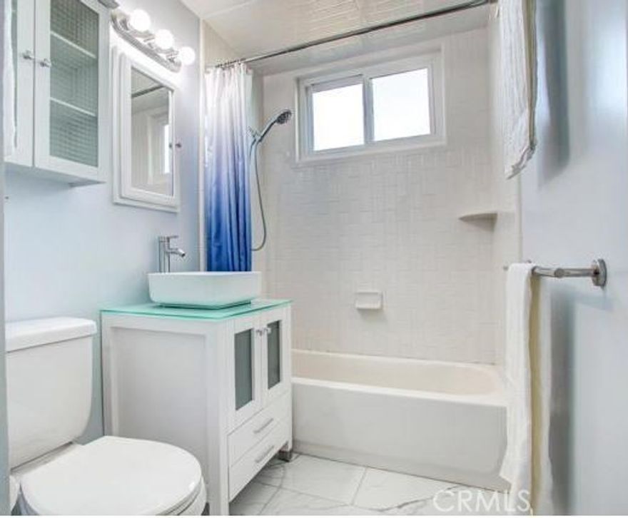 ***WOW!!!*** BEAUTIFUL, BRIGHT, AIRY AND SPACIOUS 4 BEDROOM, 2 BATH UPGRADED HOME. SPA LIKE BATHROOMS - WELL DESIGNED AND RECENTLY UPGRADED. BOTH BATHROOMS HAVE 2 ENTRANCE DOORS FOR EASE OF USE. LVP AND TILED FLOORING, KITCHEN WITH STONE COUNTERS, OPEN FLOORPLAN, A HUGE ENCLOSED PATIO / SUN ROOM WITH WALL TO WALL WINDOWS OVERLOOKING A LARGE LANDSCAPED YARD. ELEGANT CURB APPEAL WITH PAVER EDGING DESIGN IN DRIVEWAY AND WALKWAY.  DUAL PANE WINDOWS AND CIELING FANS.  HVAC system is about 4 years new. Plumbing and main sewer line were lined about 4 years ago. 4-year new garage door opener has backup battery in case of power outage. Roof is about 8 years new. A TRULY BEAUTIFUL HOME - A MUST SEE!!  EASY TO SHOW.