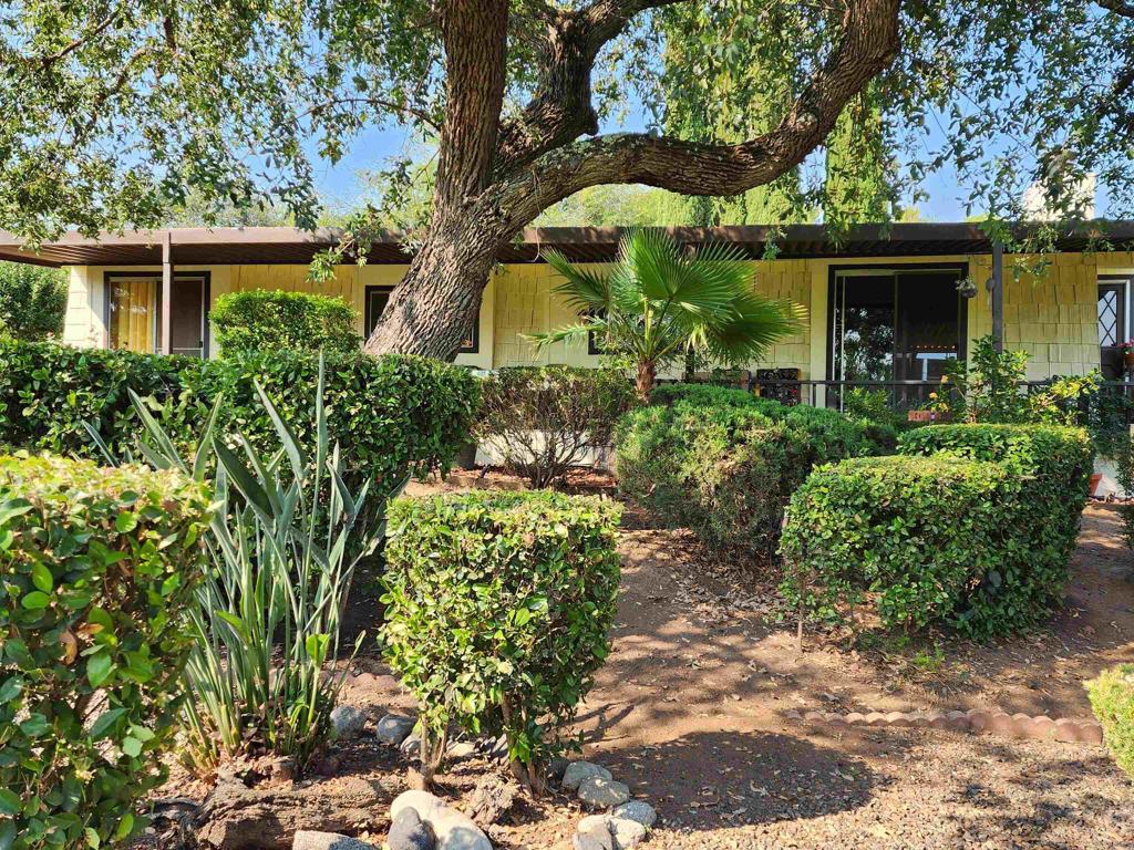 GREAT LOCATION - Close to the clubhouse and sits on the golf course. 1975 2 Bed, 2 bath, at 1368 esf. Priced for only $129,000!!! This is a nice, manufactured home in a Senior Park 55/45 with a view of the golfers plus lovely trees and bushes for privacy on your deck. Located in lovely Skyline Ranch Country Club, a premier Senior Park that sits in the foothills of Valley Center. Currently offering FREE golf to all residents, full clubhouse use, gym, gated community, dog park, and much more. This home comes with a player piano that has about 400 different scrolls to choose from!! This is a cute Split-level home. A nice gas fireplace sits in the den/dining area for enjoyable fireplace atmosphere. The primary bedroom has a glass slider opening to the front deck. The front deck is a great place for dining, entertaining, or just enjoying the beautiful nature and fresh air that Skyline Ranch has to offer. Skyline Ranch is a land leased park; the monthly space rent here is 1600.00. Please come and see this wonderful home located in a great Senior Park with many amenities.