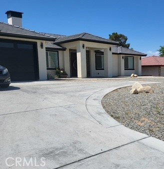 This home offers four bedrooms, three bathrooms, 2,091 living square feet on a 17,800 square foot lot, perfect for multiple vehicles including recreational vehicles, boats, quads etc.