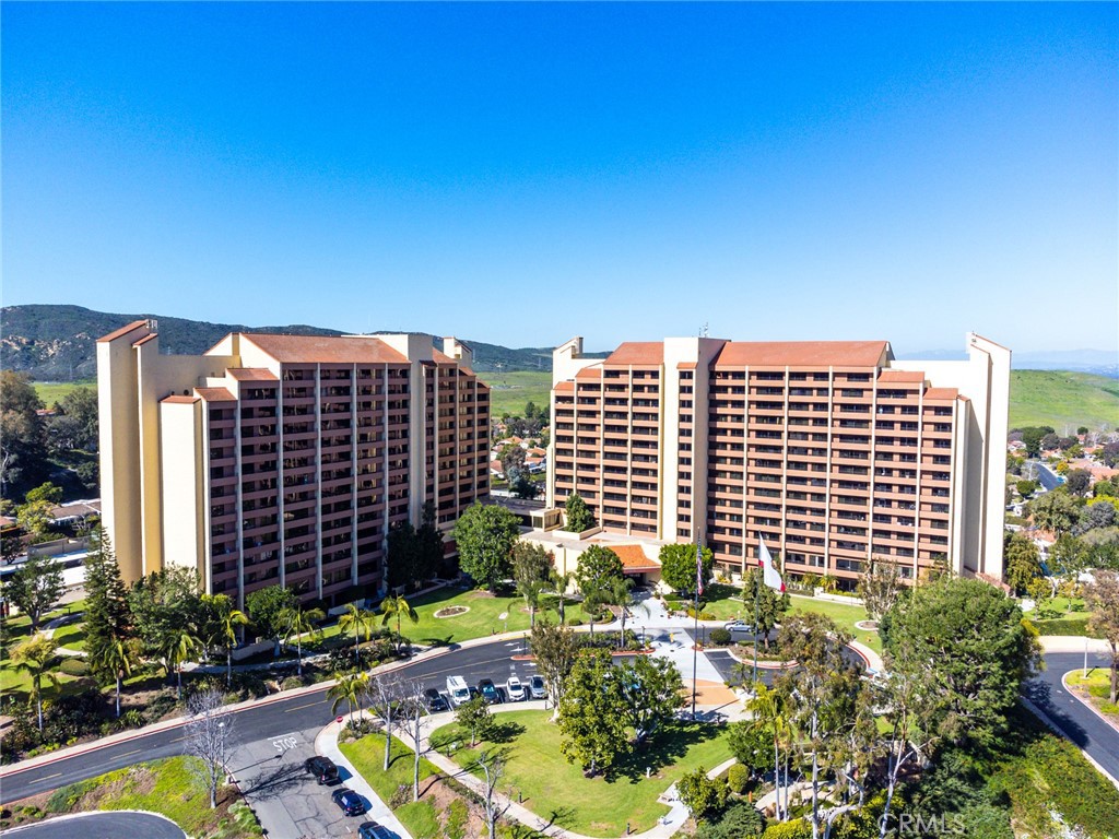 Luxury 11th Floor Condo with Stunning West-Facing Views in The Towers of Laguna Woods
Welcome to resort-style living at The Towers in Laguna Woods! This spacious 11th-floor 1-bedroom, 1.5-bath condo offers 975 square feet of comfortable living space with breathtaking west-facing views, perfect for enjoying vibrant sunsets and natural light throughout the day. Plantation shutters throughout the home provide excellent light control and privacy.
Inside, you'll find a large open layout with plenty of potential to personalize and make it your own. The convenient kitchenette provides just the right space for light meal prep, and the generous floor plan offers flexibility for dining, entertaining, or relaxing. This unit is ideal for someone ready to customize and create their dream home.
Enjoy Senior Resort Living that comes with owning a home at the Towers. Included in your monthly assessment is Dining Credits to enjoy at Latitude 50, or The Crystal Dining room, two of The Towers dining options, Bi-Weekly housekeeping, all utilities paid (except phone & internet) cable TV, planed activities and entertainment, 24 Hour Concierge Services. This is truly resort living. Plus, you enjoy all the wonderful amenities that Laguna Woods Village 55+ Gated Resort Community has to offer. 2 Professional Golf Courses and a 9 hole Executive Course, 7 clubs houses, 5 Pools, Fitness Centers, Tennis and Pickleball courts, a state of the art Theater, Equestrian Center, Art Studios, over 250 Social Clubs and Organizations, Free Bus transportation within the community as well as to local shopping centers, medical building, all this and only 5 miles to beautiful Laguna Beach.