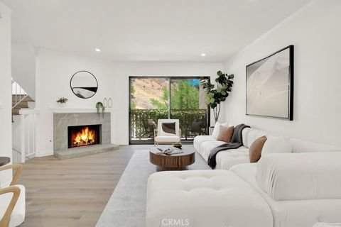 Photo of 26008 Alizia Canyon Dr #C, Calabasas, CA 91302 (MLS # SR26008173)