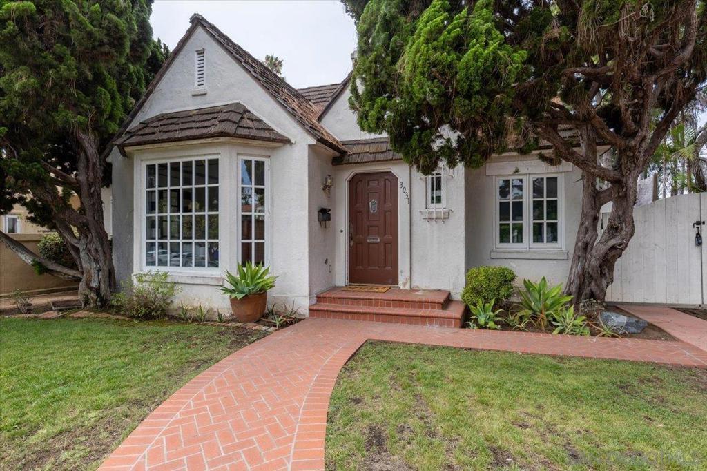 Step into timeless elegance with this 1935 Tudor-style gem nestled in one of Point Loma’s most desirable neighborhoods. Brimming with original character and curb appeal, this home offers a thoughtfully designed floor plan with excellent flow and generous flexible spaces ideal for both comfortable everyday living and entertaining. Inside, you’ll find classic architectural details, including, rich wood accents that speak to the home's heritage. Large living areas, a spacious primary suite and a layout full of potential. Step into timeless elegance with this 1935 Tudor-style gem nestled in one of Point Loma’s most desirable neighborhoods. Brimming with original character and curb appeal, this home offers a thoughtfully designed floor plan with excellent flow and generous usable space—ideal for both comfortable everyday living and stylish entertaining. Inside, you’ll find classic architectural details, including, rich wood accents that speak to the home's heritage. With large living areas and a spacious primary suite and a layout full of potential, this home is perfect for those looking to enjoy its vintage charm or reimagine it with modern updates. Don’t miss this rare opportunity to own a piece of Point Loma history in a truly special community.